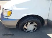 ✅ 2001 Toyota Sienna LE • VIN: 4T3ZF13C31U393989 • Lot: 42301091. Listed on IAAI with 238,404 mi. Free auction sales archive from the USA and detailed vehicle history report at DreamBid. Image 6.