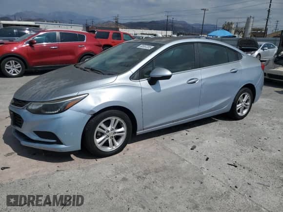 ✅ 2018 Chevrolet Cruze LT • VIN: 1G1BE5SM2J7114834 • Lot: 80557205. Listed on Copart with 131,256 mi. Free auction sales archive from the USA and detailed vehicle history report at DreamBid. Image 1.