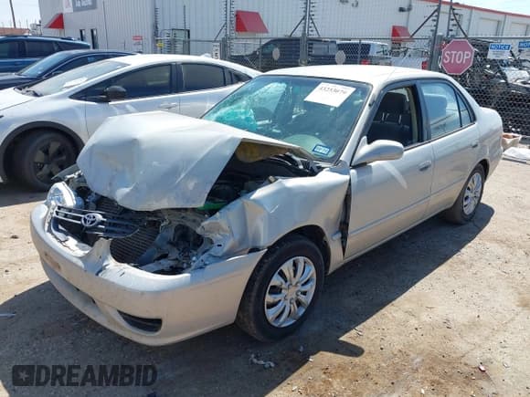 ✅ 2001 Toyota Corolla CE • VIN: 1NXBR12E21Z444760 • Lot: 43253079. Listed on IAAI with Not provided. Free auction sales archive from the USA and detailed vehicle history report at DreamBid. Image 18.