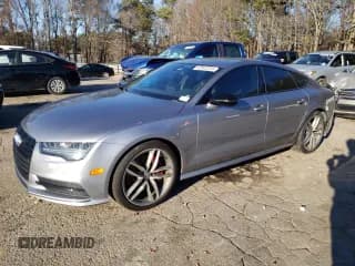 ✅ 2018 Audi A7 • VIN: WAUW3BFC8JN090059 • Lot: 42802324. Wystawiony na Copart z przebiegiem 60 752 mil. Bezpłatny archiwum sprzedaży aukcyjnych z USA i szczegółowy raport historii pojazdu na DreamBid. Zdjęcie 1.