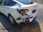 ✅ 2023 Tesla Model Y Long Range • VIN: 7SAYGDEE3PF897016 • Lot: 40407572. Listed on IAAI with 8,030 mi. Free auction sales archive from the USA and detailed vehicle history report at DreamBid. Image 6.