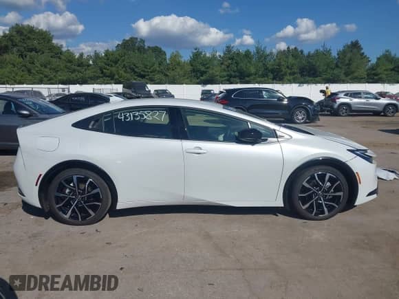 2025 Toyota Prius SE with VIN JTDACACU9S3047156, listed as a IAAI auction lot 43135827 with 2,433 mi miles and . Bid and sale history available at DreamBid. Image 14.