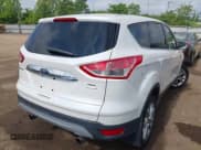 ✅ 2013 Ford Escape SEL • VIN: 1FMCU9HX6DUB14053 • Lot: 42361297. Wystawiony na IAAI z przebiegiem 144 861 mil. Bezpłatny archiwum sprzedaży aukcyjnych z USA i szczegółowy raport historii pojazdu na DreamBid. Zdjęcie 4.