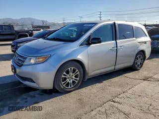 ✅ 2011 Honda Odyssey EX • VIN: 5FNRL5H47BB074409 • Lot: 94822195. Listed on Copart with 59,141 mi. Free auction sales archive from the USA and detailed vehicle history report at DreamBid. Image 1.
