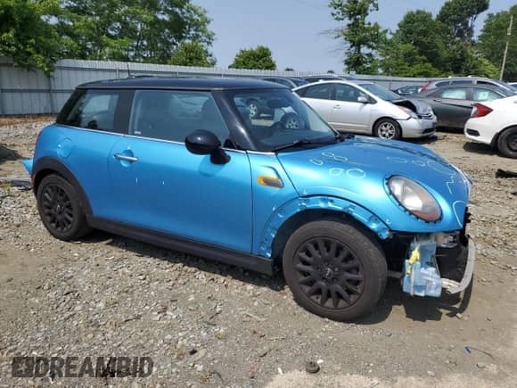 2017 MINI Hardtop Cooper with VIN WMWXP5C52H3C63759, listed as a Copart auction lot 60203935 with 118,339 mi miles and Salvage title. Bid and sale history available at DreamBid. Image 4.