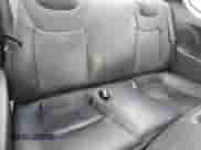 2010 Hyundai Genesis Coupe Track z VIN KMHHU6KHXAU025524, wystawiony jako Copart lot #52119665 z przebiegiem 134 693 mil mil oraz Szkoda całkowita • Salvage title. Historia ofert i sprzedaży dostępna na DreamBid. Obrazek 10.