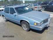 ✅ 1992 Cadillac DeVille • VIN: 1G6CD53B0N4286396 • Lot: 42278473. Listed on IAAI with 94,186 mi. Free auction sales archive from the USA and detailed vehicle history report at DreamBid. Image 1.