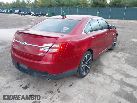 ✅ 2014 Ford Taurus SEL • VIN: 1FAHP2E81EG117230 • Lot: 43522256. Listed on IAAI with 184,269 mi. Free auction sales archive from the USA and detailed vehicle history report at DreamBid. Image 4.