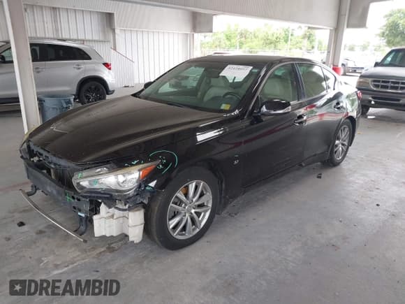 ✅ 2014 Infiniti Q50 Premium • VIN: JN1BV7APXEM688557 • Lot: 42428057. Wystawiony na IAAI z przebiegiem 139 364 mil. Bezpłatny archiwum sprzedaży aukcyjnych z USA i szczegółowy raport historii pojazdu na DreamBid. Zdjęcie 17.