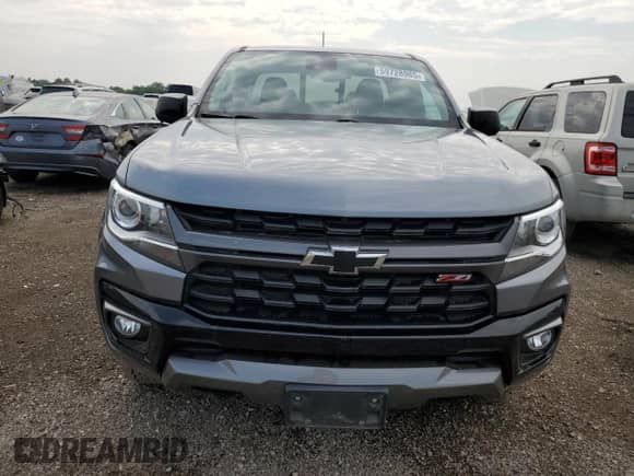 2021 Chevrolet Colorado 4WD Z71 z VIN 1GCHTDEN8M1244758, wystawiony jako Copart lot #59728985 z przebiegiem 62 020 mil mil oraz Szkoda całkowita • Salvage title. Historia ofert i sprzedaży dostępna na DreamBid. Obrazek 5.