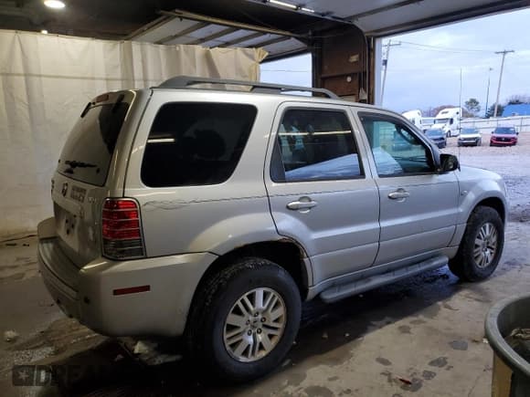 ✅ 2007 Mercury Mariner Premier • VIN: 4M2CU97147KJ02737 • Lot: 91291695. Wystawiony na Copart z przebiegiem 187 727 mil. Bezpłatny archiwum sprzedaży aukcyjnych z USA i szczegółowy raport historii pojazdu na DreamBid. Zdjęcie 3.