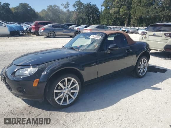 ✅ 2006 Mazda MX-5 Miata Grand Touring • VIN: JM1NC25F660101087 • Lot: 91472985. Wystawiony na Copart z przebiegiem 54 683 mil. Bezpłatny archiwum sprzedaży aukcyjnych z USA i szczegółowy raport historii pojazdu na DreamBid. Zdjęcie 1.