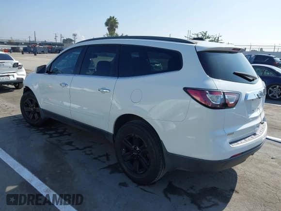 ✅ 2016 Chevrolet Traverse LT • VIN: 1GNKRGKD1GJ133482 • Lot: 43608909. Listed on IAAI with 140,447 mi. Free auction sales archive from the USA and detailed vehicle history report at DreamBid. Image 3.