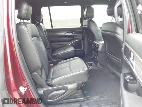 ✅ 2024 Jeep Wagoneer Series II • VIN: 1C4SJVBP1RS174495 • Lot: 43856473. Listed on IAAI with 56,700 mi. Free auction sales archive from the USA and detailed vehicle history report at DreamBid. Image 8.