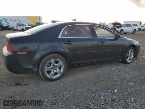 ✅ 2012 Chevrolet Malibu 1LS • VIN: 1G1ZB5E01CF153620 • Lot: 72558544. Listed on Copart with 170,733 mi. Free auction sales archive from the USA and detailed vehicle history report at DreamBid. Image 3.