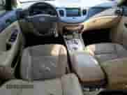 2009 Hyundai Genesis z VIN KMHGC46E69U052024, wystawiony jako Copart lot #76129664 z przebiegiem 173 883 mil mil oraz Szkoda całkowita • Salvage title. Historia ofert i sprzedaży dostępna na DreamBid. Obrazek 8.