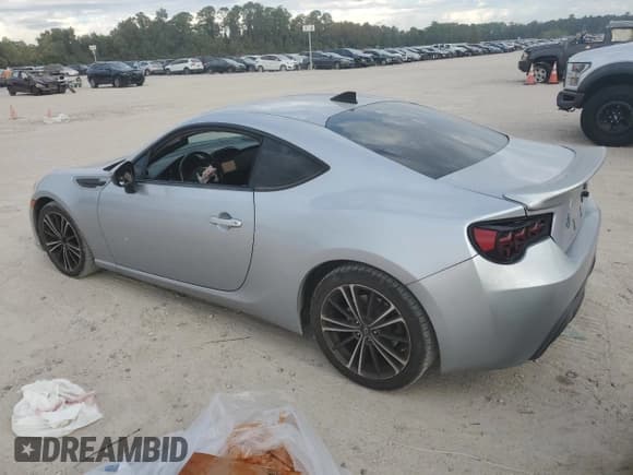 ✅ 2015 Subaru BRZ Premium • VIN: JF1ZCAB18F9604304 • Lot: 86608215. Listed on Copart with 140,352 mi. Free auction sales archive from the USA and detailed vehicle history report at DreamBid. Image 2.