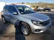 ✅ 2012 Volkswagen Tiguan LE • VIN: WVGAV7AX2CW580035 • Lot: 47297205. Listed on Copart with 118,211 mi. Free auction sales archive from the USA and detailed vehicle history report at DreamBid. Image 4.