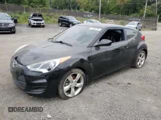 2013 Hyundai Veloster w/Gray Int z VIN KMHTC6AD5DU162385, wystawiony jako Copart lot #71346754 z przebiegiem 86 922 mil mil oraz Szkoda całkowita • Salvage title. Historia ofert i sprzedaży dostępna na DreamBid. Obrazek 1.