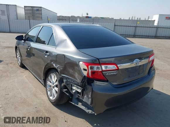 2013 Toyota Camry L with VIN 4T4BF1FK7DR297029, listed as a IAAI auction lot 43121416 with 200,854 mi miles and . Bid and sale history available at DreamBid. Image 3.