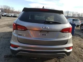 ✅ 2017 Hyundai Santa Fe 2.4L • VIN: 5XYZTDLB0HG389263 • Лот: 72108742. Опубликован ранее на Copart с пробегом 136 176 миль. Бесплатный доступ к архиву аукционных продаж из США и подробный отчёт об истории автомобиля на DreamBid. Изображение 6.