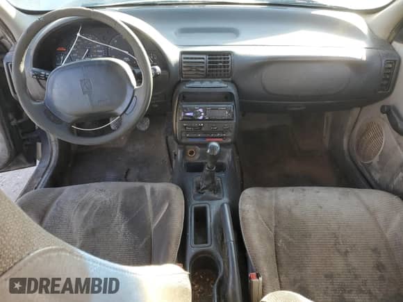 1998 Saturn SL z VIN 1G8ZF5287WZ120978, wystawiony jako Copart lot #43070995 z przebiegiem 279 889 mil mil oraz Szkoda całkowita • Salvage title. Historia ofert i sprzedaży dostępna na DreamBid. Obrazek 8.