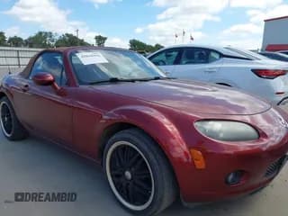 ✅ 2006 Mazda MX-5 Miata Touring • VIN: JM1NC25F960104131 • Lot: 42818426. Wystawiony na IAAI z przebiegiem 118 085 mil. Bezpłatny archiwum sprzedaży aukcyjnych z USA i szczegółowy raport historii pojazdu na DreamBid. Zdjęcie 1.