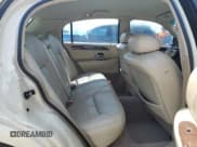 ✅ 1999 Lincoln Town Car Cartier • VIN: 1LNHM83W7XY655074 • Lot: 66132035. Wystawiony na Copart z przebiegiem Nie podano. Bezpłatny archiwum sprzedaży aukcyjnych z USA i szczegółowy raport historii pojazdu na DreamBid. Zdjęcie 10.