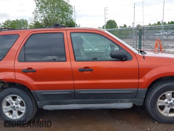 ✅ 2006 Ford Escape XLT • VIN: 1FMYU03156KA55418 • Lot: 42193005. Listed on IAAI with 197,823 mi. Free auction sales archive from the USA and detailed vehicle history report at DreamBid. Image 13.