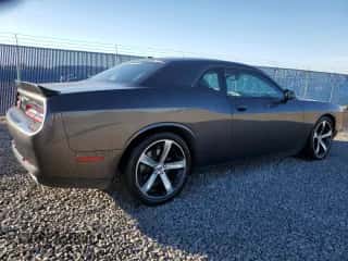 2016 Dodge Challenger R/T Plus Shaker z VIN 2C3CDZBT4GH239509, wystawiony jako Copart lot #89880595 z przebiegiem 126 114 mil mil oraz Czysty tytuł • Clean title. Historia ofert i sprzedaży dostępna na DreamBid. Obrazek 3.