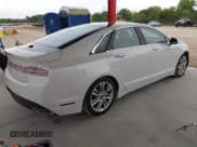 ✅ 2014 Lincoln MKZ Hybrid • VIN: 3LN6L2LU2ER817257 • Lot: 43149857. Listed on IAAI with 117,590 mi. Free auction sales archive from the USA and detailed vehicle history report at DreamBid. Image 4.