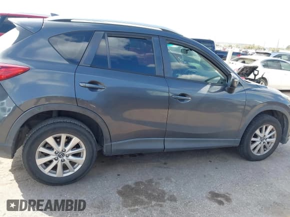 ✅ 2016 Mazda CX-5 Sport • VIN: JM3KE2BY0G0757538 • Лот: 43437546. Опубликован ранее на IAAI с пробегом 156 787 миль. Бесплатный доступ к архиву аукционных продаж из США и подробный отчёт об истории автомобиля на DreamBid. Изображение 13.