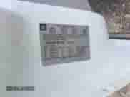 2014 Chevrolet Suburban LT z VIN 1GNSCJE07ER211222, wystawiony jako IAAI lot #42428084 z przebiegiem 214 712 mil mil oraz . Historia ofert i sprzedaży dostępna na DreamBid. Obrazek 9.