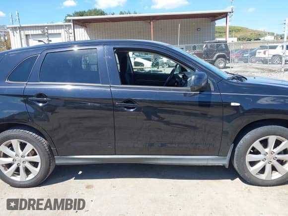 2015 Mitsubishi Outlander ES with VIN 4A4AP3AU6FE010443, listed as a IAAI auction lot 43188413 with 148,484 mi miles and . Bid and sale history available at DreamBid. Image 14.