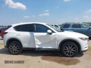 ✅ 2018 Mazda CX-5 Touring • VIN: JM3KFACM6J0398108 • Lot: 43235213. Wystawiony na IAAI z przebiegiem 114 451 mil. Bezpłatny archiwum sprzedaży aukcyjnych z USA i szczegółowy raport historii pojazdu na DreamBid. Zdjęcie 13.