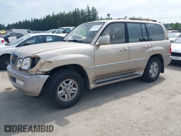✅ 2001 Lexus LX 470 • VIN: JTJHT00W413507883 • Lot: 42462661. Wystawiony na IAAI z przebiegiem 235 943 mil. Bezpłatny archiwum sprzedaży aukcyjnych z USA i szczegółowy raport historii pojazdu na DreamBid. Zdjęcie 2.