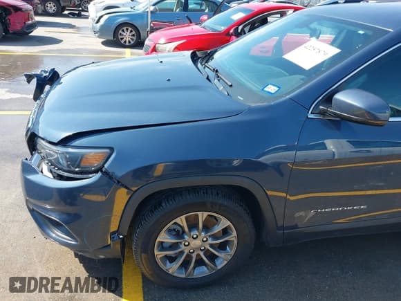 ✅ 2019 Jeep Cherokee Latitude Plus • VIN: 1C4PJLLX9KD469704 • Lot: 42257879. Listed on IAAI with 90,917 mi. Free auction sales archive from the USA and detailed vehicle history report at DreamBid. Image 18.