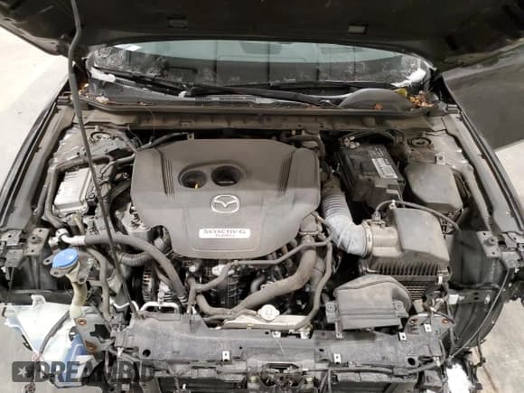 ✅ 2021 Mazda 3 2.5 Turbo • VIN: 3MZBPBAY7MM253403 • Лот: 85651764. Опубликован ранее на Copart с пробегом 62 252 миль. Бесплатный доступ к архиву аукционных продаж из США и подробный отчёт об истории автомобиля на DreamBid. Изображение 11.