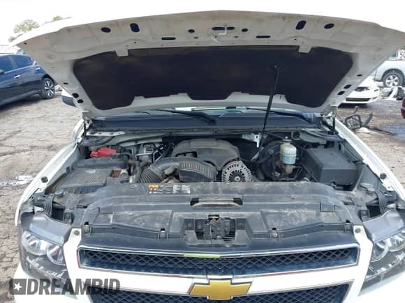 2014 Chevrolet Suburban LT z VIN 1GNSCJE07ER211222, wystawiony jako IAAI lot #42428084 z przebiegiem 214 712 mil mil oraz . Historia ofert i sprzedaży dostępna na DreamBid. Obrazek 10.