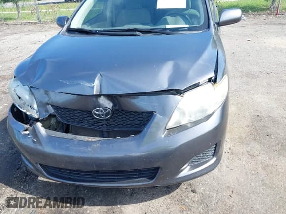 ✅ 2010 Toyota Corolla • VIN: JTDBU4EE0AJ075558 • Lot: 42333233. Listed on IAAI with 98,969 mi. Free auction sales archive from the USA and detailed vehicle history report at DreamBid. Image 6.