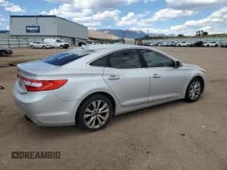 2014 Hyundai Azera z VIN KMHFG4JG1EA357516, wystawiony jako Copart lot #73840204 z przebiegiem 170 249 mil mil oraz Czysty tytuł • Clean title. Historia ofert i sprzedaży dostępna na DreamBid. Obrazek 3.