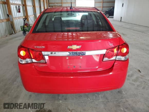 2014 Chevrolet Cruze 1LT z VIN 1G1PC5SB7E7419438, wystawiony jako Copart lot #62817625 z przebiegiem 138 033 mil mil oraz Szkoda całkowita • Salvage title. Historia ofert i sprzedaży dostępna na DreamBid. Obrazek 6.