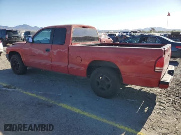 ✅ 1999 Dodge Dakota SLT • VIN: 1B7GL22Y2XS193321 • Lot: 50845475. Wystawiony na Copart z przebiegiem 249 030 mil. Bezpłatny archiwum sprzedaży aukcyjnych z USA i szczegółowy raport historii pojazdu na DreamBid. Zdjęcie 2.