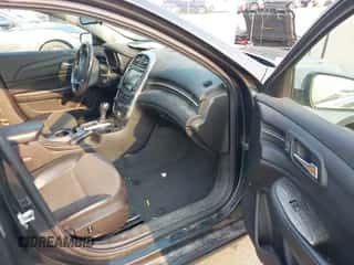 2014 Chevrolet Malibu LT z VIN 1G11E5SL0EF281823, wystawiony jako IAAI lot #42891165 z przebiegiem 138 778 mil mil oraz . Historia ofert i sprzedaży dostępna na DreamBid. Obrazek 5.