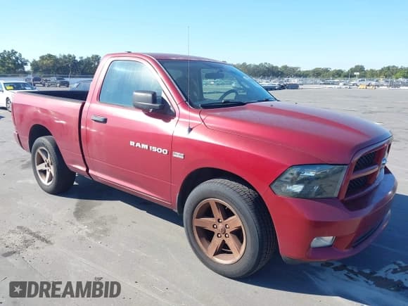 ✅ 2012 Ram 1500 Tradesman • VIN: 3C6JD6AT0CG277744 • Lot: 43715991. Listed on IAAI with 151,135 mi. Free auction sales archive from the USA and detailed vehicle history report at DreamBid. Image 1.