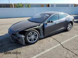 ✅ 2015 Tesla Model S 85 • VIN: 5YJSA1S10FF098989 • Лот: 68510685. Опубликован ранее на Copart с пробегом 75 002 миль. Бесплатный доступ к архиву аукционных продаж из США и подробный отчёт об истории автомобиля на DreamBid. Изображение 1.