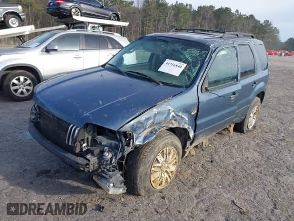 2006 Mercury Mariner Luxury с VIN 4M2CU57186DJ07953, выставлен на аукционе IAAI как лот 41756840 с пробегом 163 988 миль миль и . История ставок и продаж доступна на DreamBid. Изображение 2.