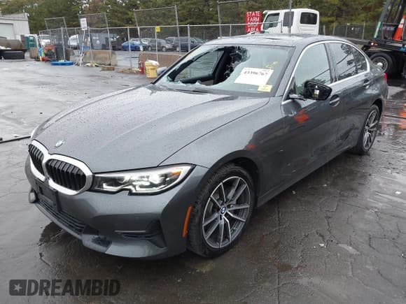 ✅ 2020 BMW 3 Series 330i xDrive • VIN: 3MW5R7J02L8B28220 • Lot: 43396767. Listed on IAAI with 60,487 mi. Free auction sales archive from the USA and detailed vehicle history report at DreamBid. Image 2.