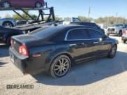 ✅ 2012 Chevrolet Malibu LTZ • VIN: 1G1ZG5E74CF146000 • Lot: 76532814. Listed on Copart with 156,469 mi. Free auction sales archive from the USA and detailed vehicle history report at DreamBid. Image 3.