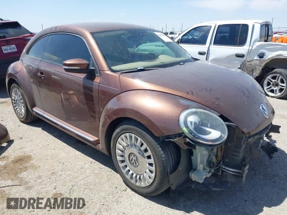 ✅ 2016 Volkswagen Beetle SE • VIN: 3VWJ07AT4GM634261 • Lot: 42043450. Listed on IAAI with 107,280 mi. Free auction sales archive from the USA and detailed vehicle history report at DreamBid. Image 1.